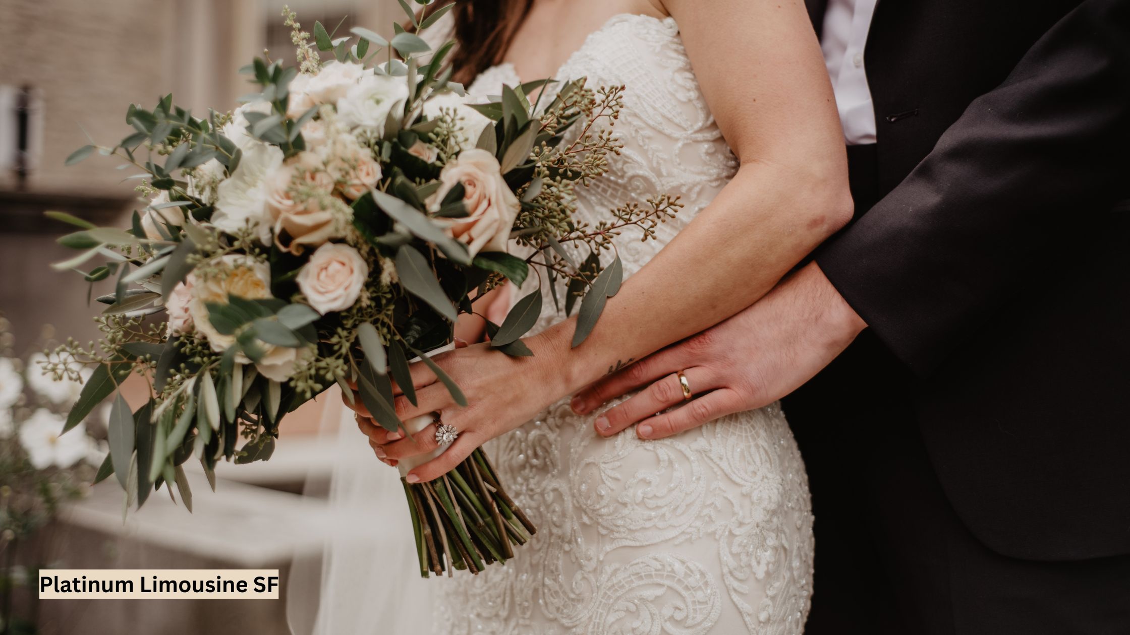 Closeup of a joyful bridal couple at a San Francisco wedding in elegant wedding attire